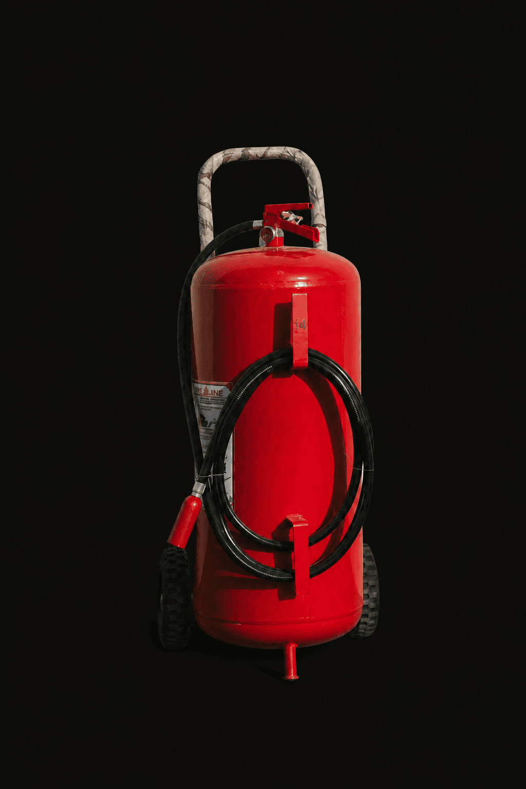 Large red wheeled fire extinguisher